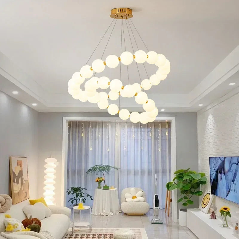 Beaded ring chandelier at 16.5 in across with a polished chrome finish