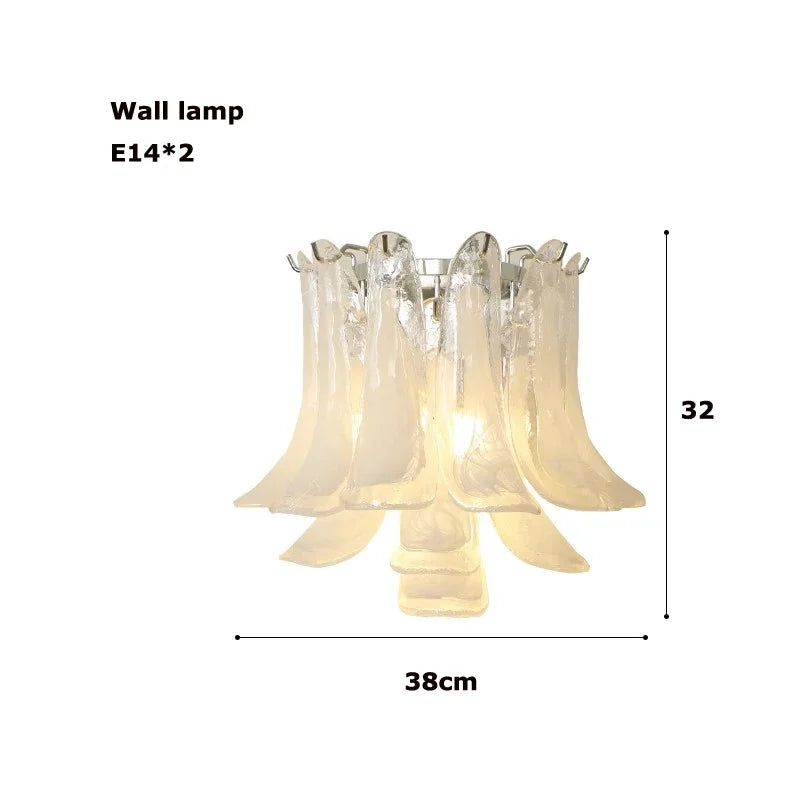 Petal shaped glass shades on a gold polished steel chandelier body