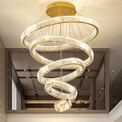 Three ring crystal chandelier, 31.5 in widest ring, on an iron frame