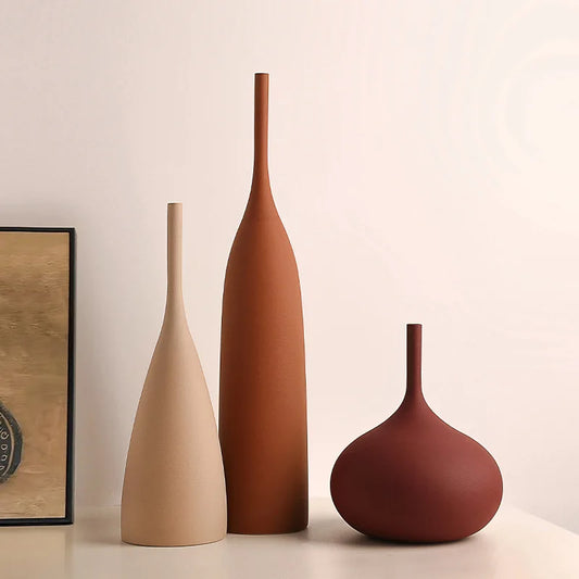 Handmade ceramic wabi-sabi vase in Morandi beige on shelf