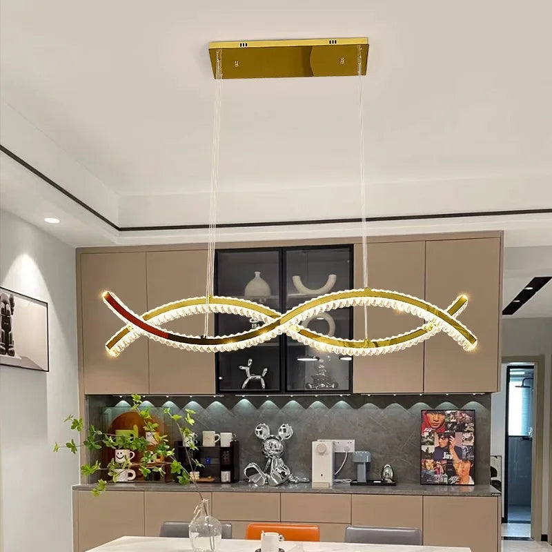 Ironwork and crystal bar chandelier in gold for a dining table