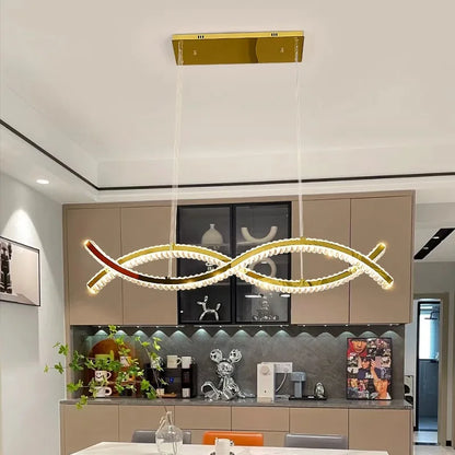 Ironwork and crystal bar chandelier in gold for a dining table