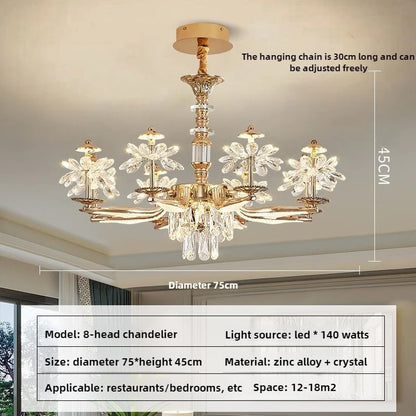 Crystal petals opening from a central gold zinc alloy chandelier stem