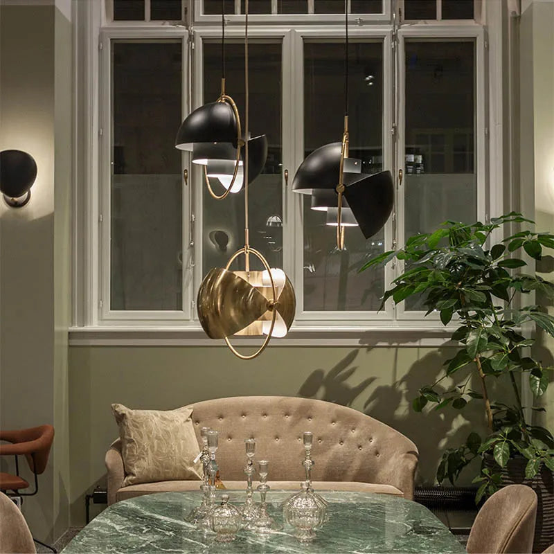 Nordic metal chandelier casting a gentle circle of warm white light