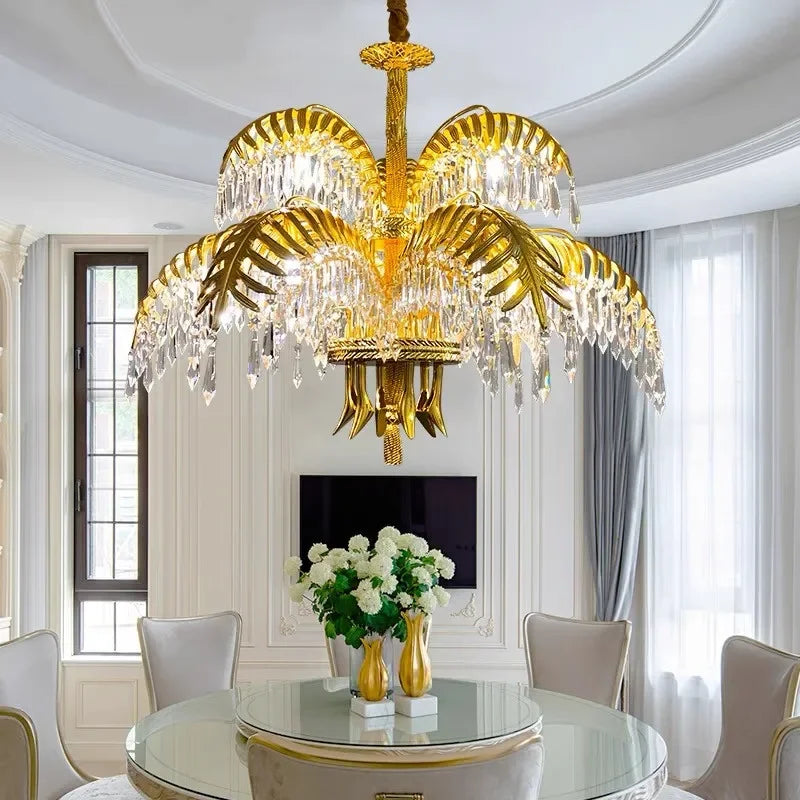 Gilded palm fronds carrying clear K9 crystal on a chandelier