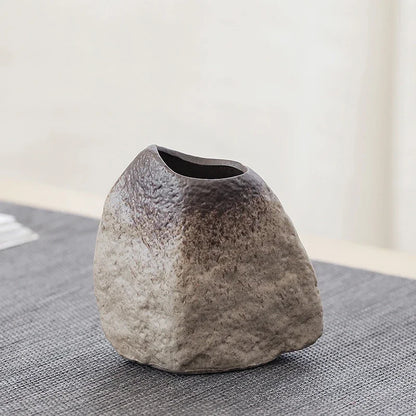 Style G Chinese pottery bud vase displayed with single dried flower stem