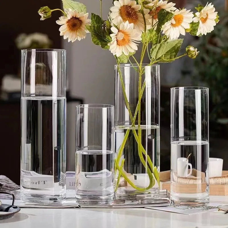 Wide glass cylinder vase 8x8cm with hydroponic greenery on home office desk