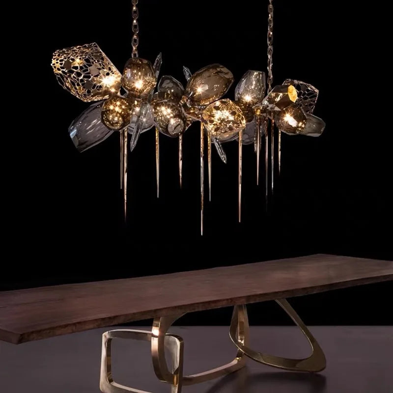 Vintage metal glass chandelier with glass shades on a plated chain mount